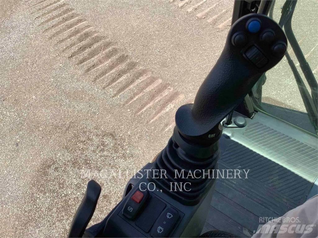 CAT MH3024  휠 굴삭기