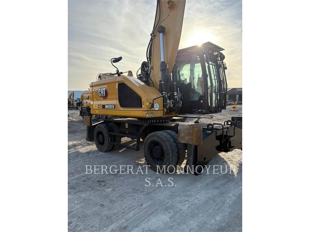 CAT MH3024  휠 굴삭기