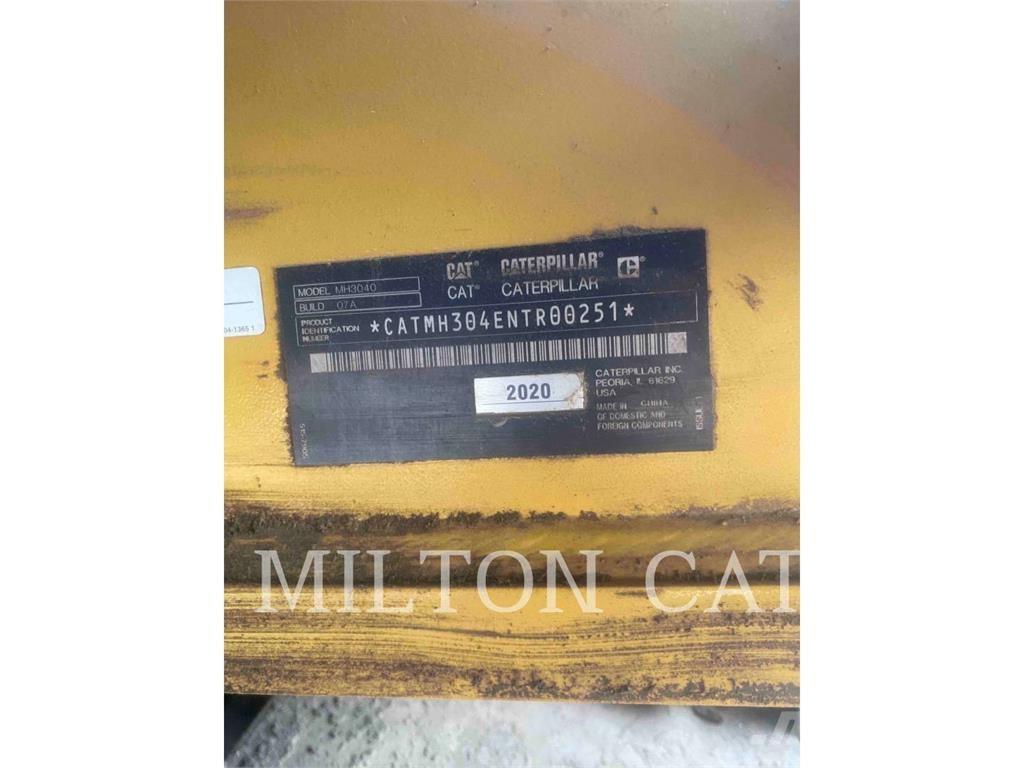 CAT MH3040-07  휠 굴삭기