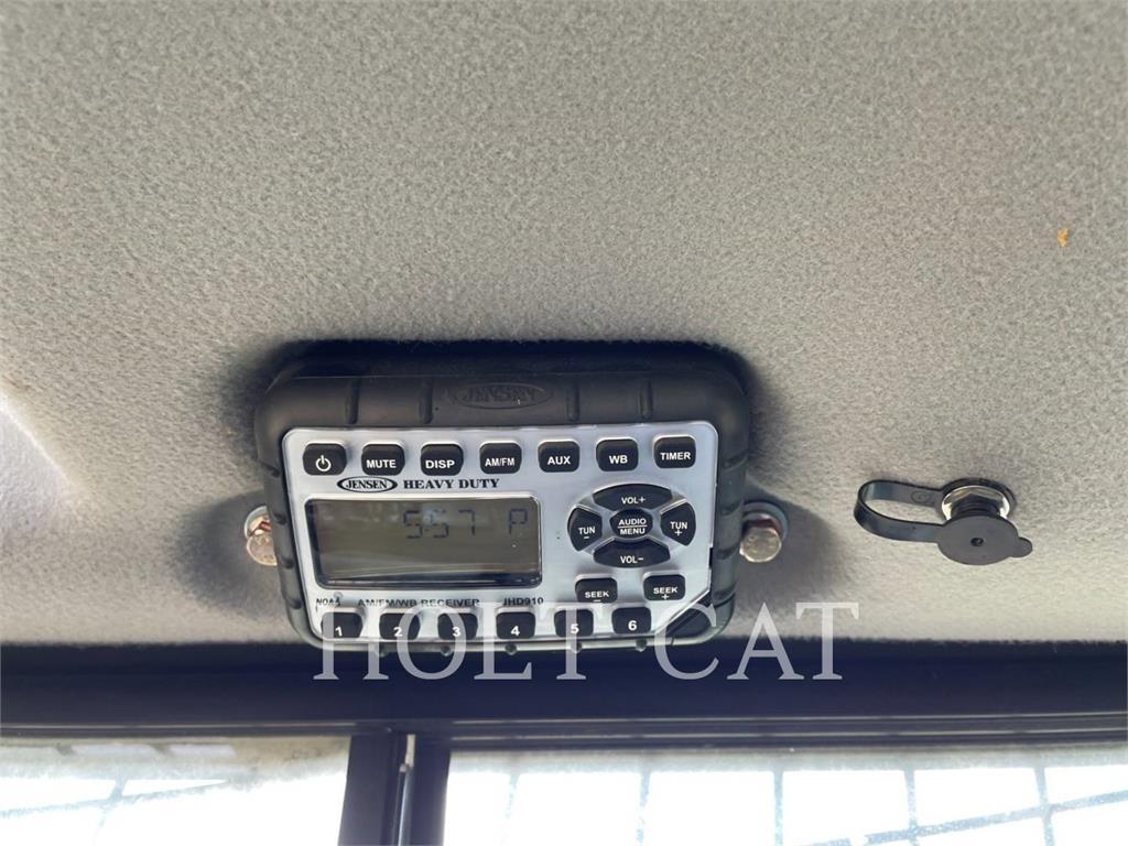 New Holland C237 궤도식 로우더