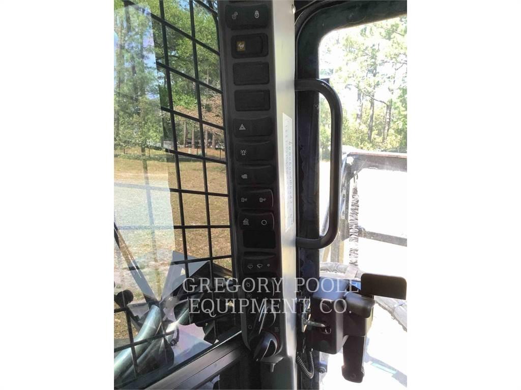 New Holland C345 궤도식 로우더
