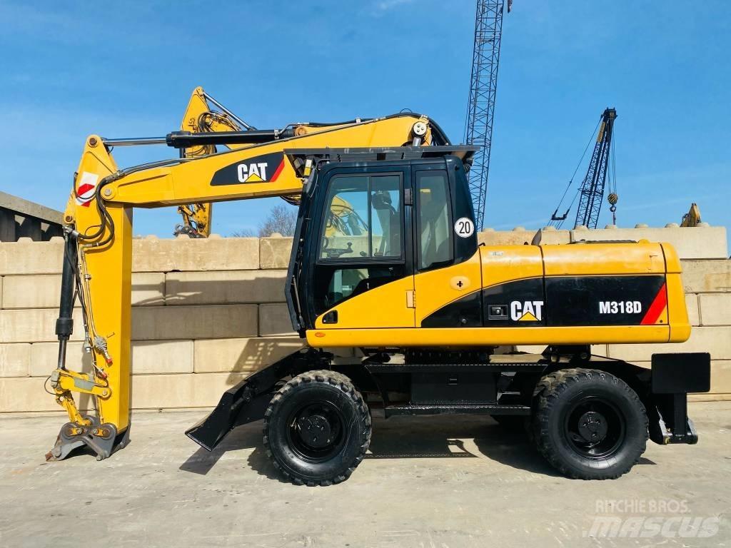 CAT M 318 D  휠 굴삭기