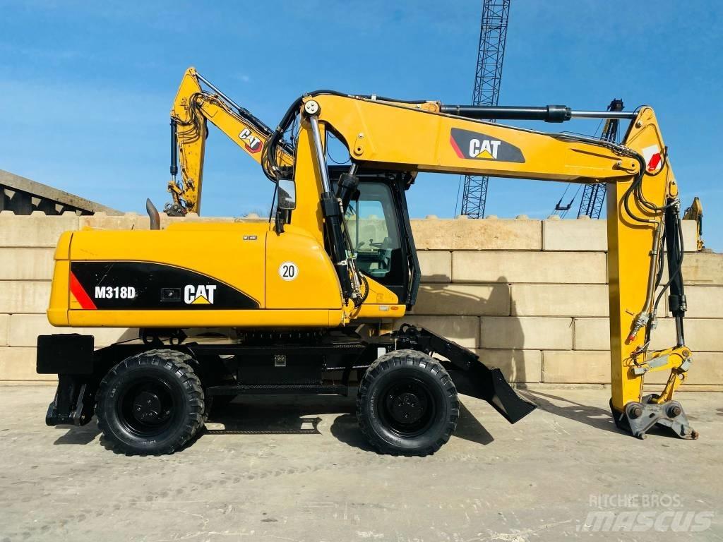 CAT M 318 D  휠 굴삭기