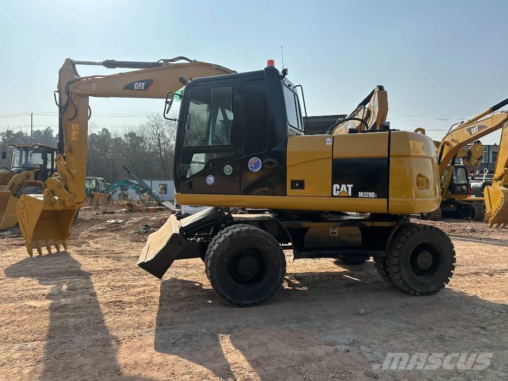 CAT M 320D  휠 굴삭기