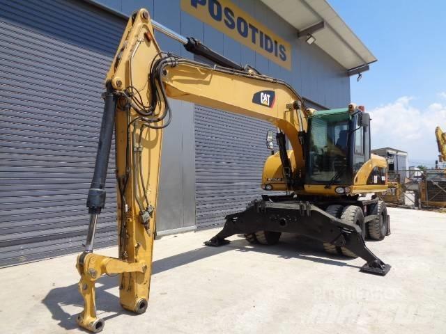 CAT M 318 D  휠 굴삭기