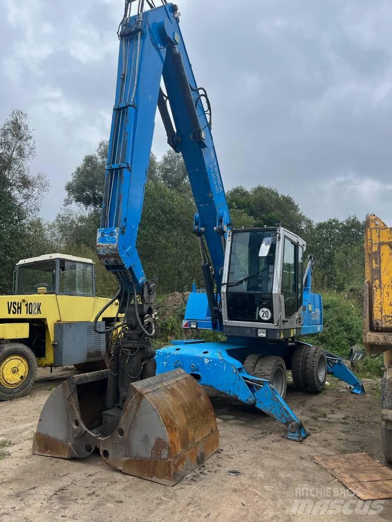 Fuchs MHL 320  휠 굴삭기
