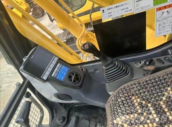 Komatsu PC 200 중형굴삭기 7톤-28톤