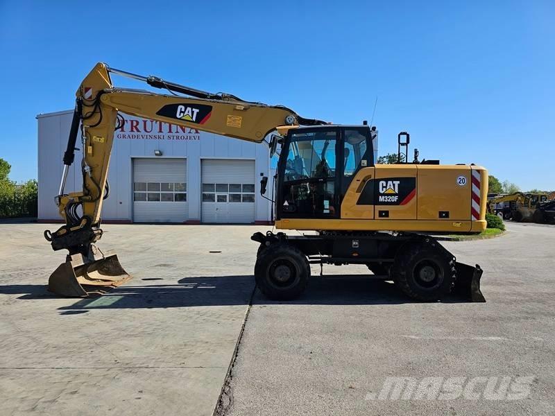 CAT M 320F  휠 굴삭기