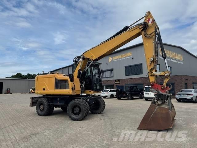 CAT M 318 F  휠 굴삭기