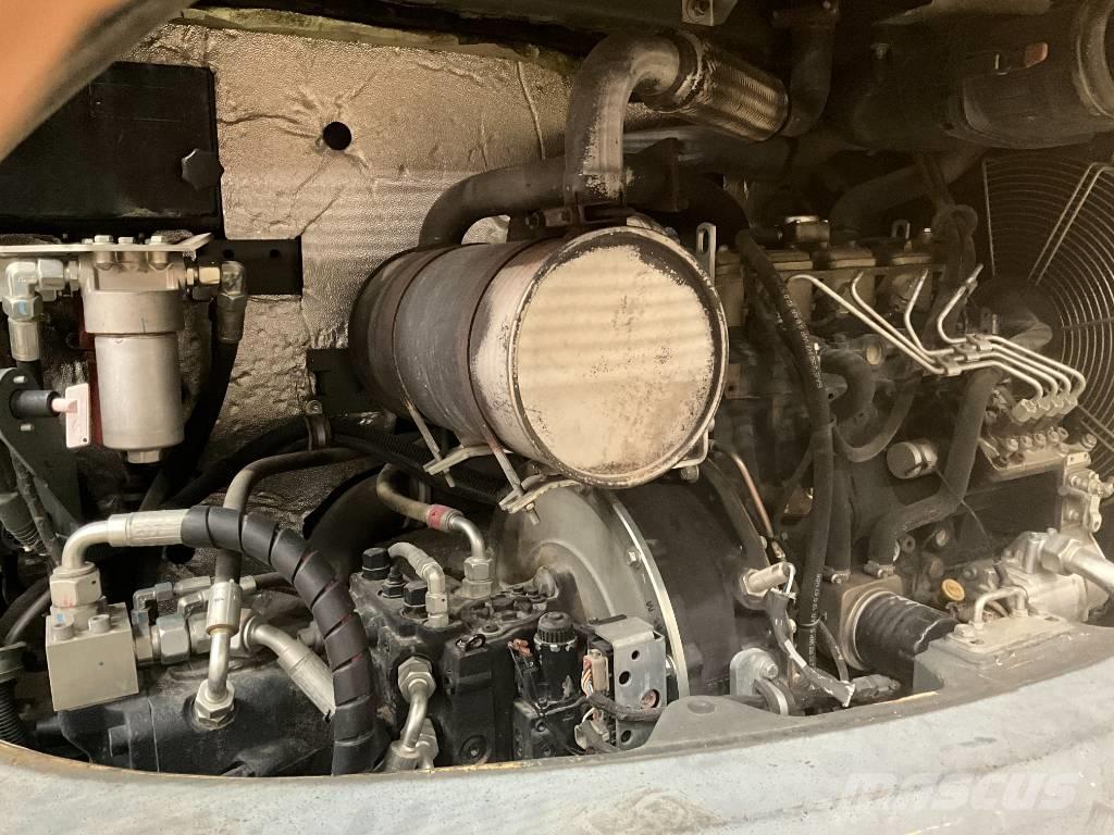 Neuson EW 65  휠 굴삭기