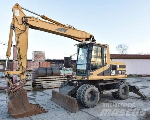 CAT M 315  휠 굴삭기