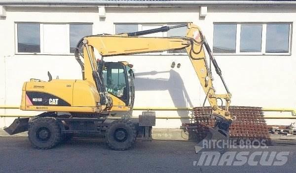 CAT M 315 D  휠 굴삭기