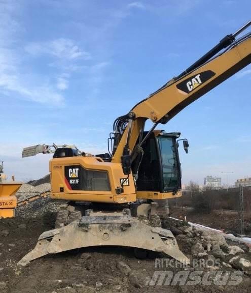 CAT M317 F  휠 굴삭기