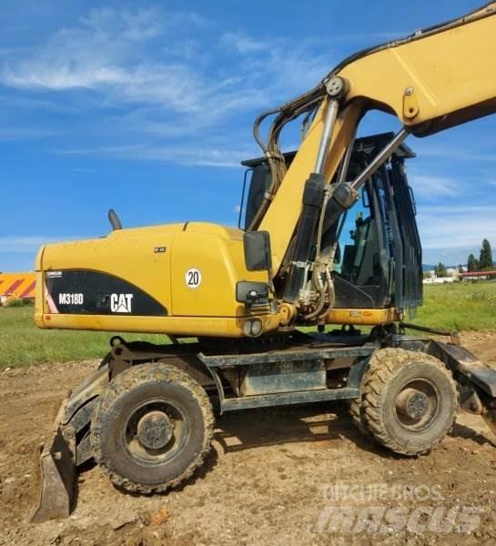 CAT M318 D  휠 굴삭기