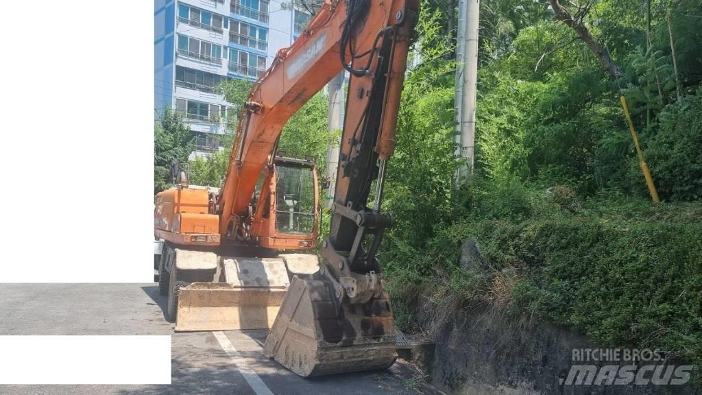 Doosan DX 210 W  휠 굴삭기