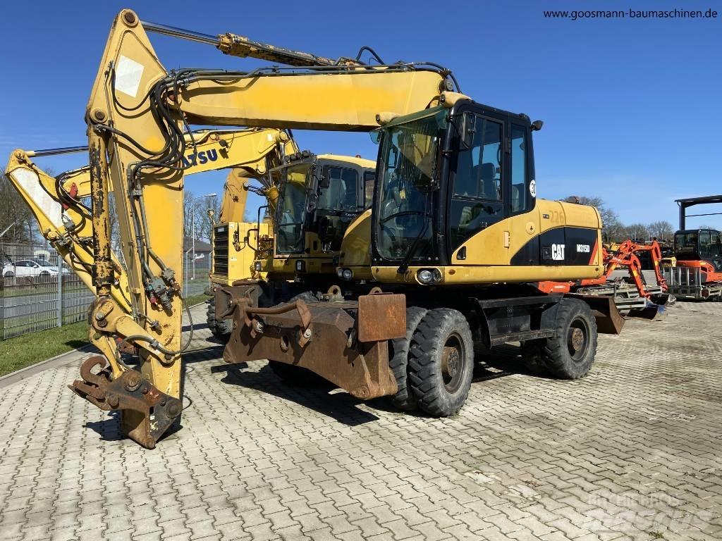 CAT M 315 D  휠 굴삭기