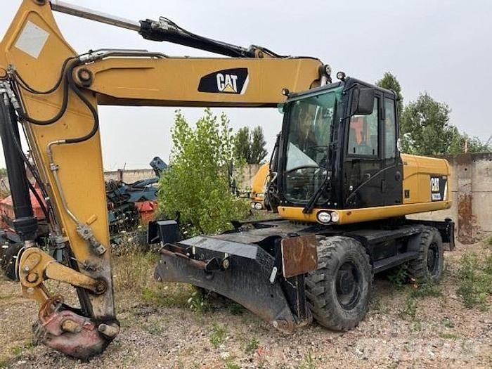 CAT M 322 D  휠 굴삭기