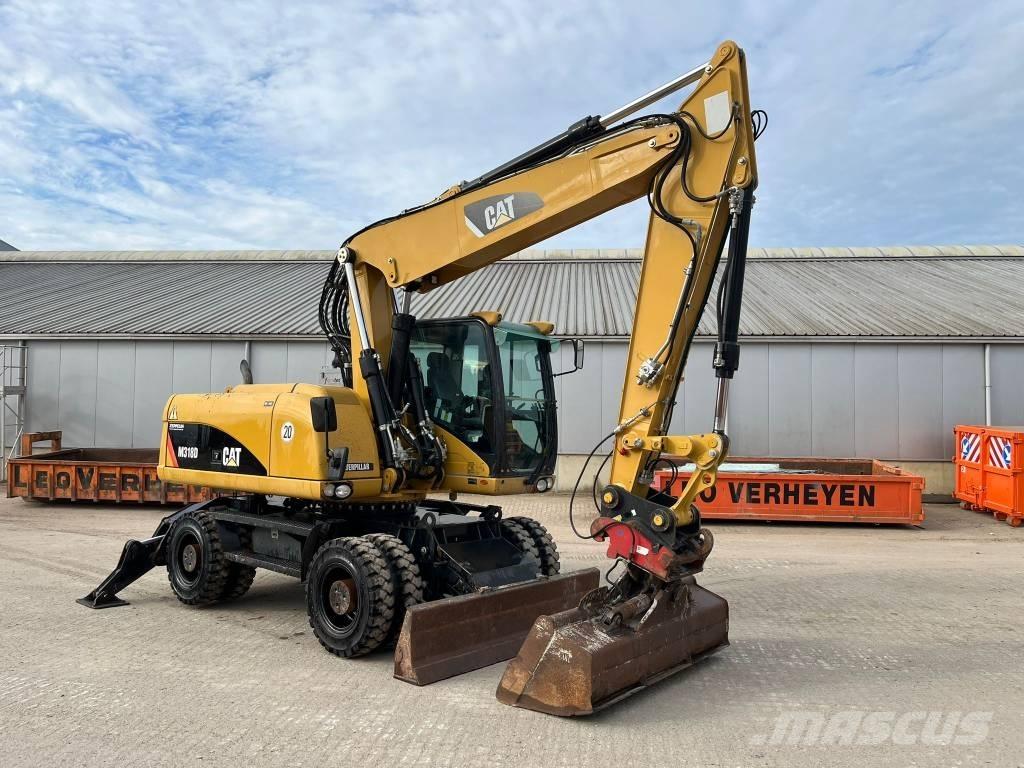 CAT M 318 D  휠 굴삭기