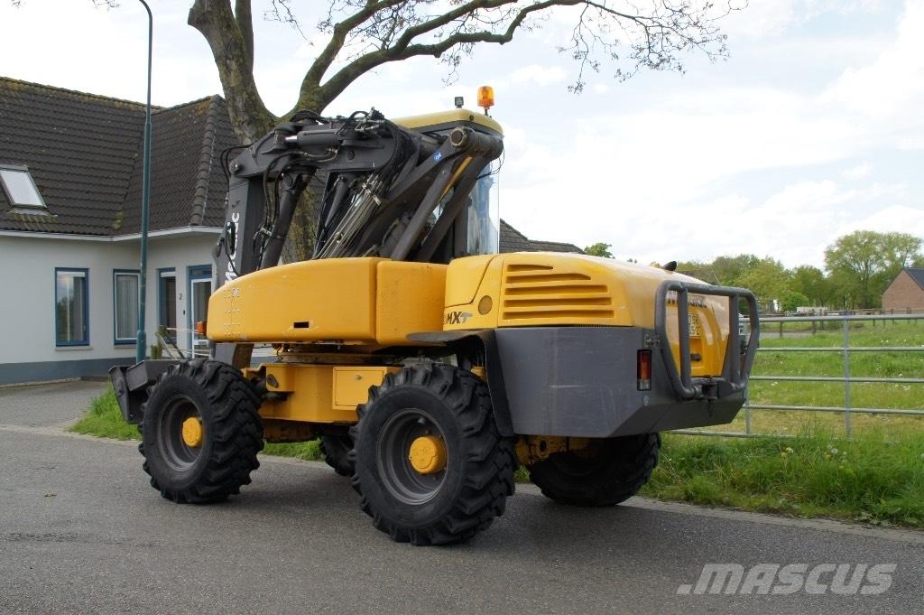 Mecalac 12 MXT  휠 굴삭기