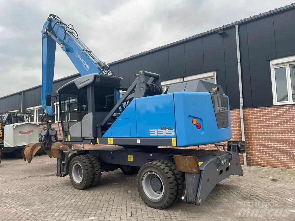 Fuchs MHL335  휠 굴삭기