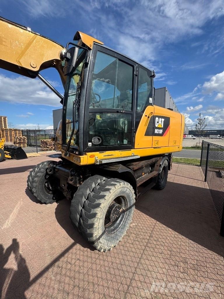 CAT 318  휠 굴삭기