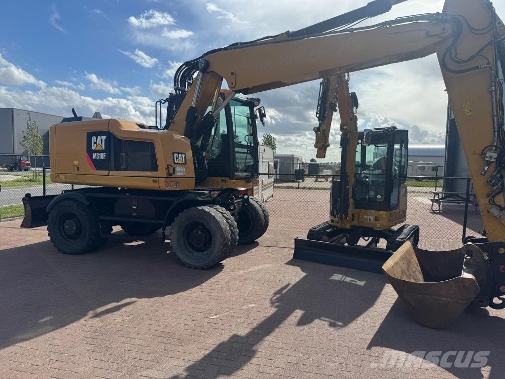 CAT 318  휠 굴삭기