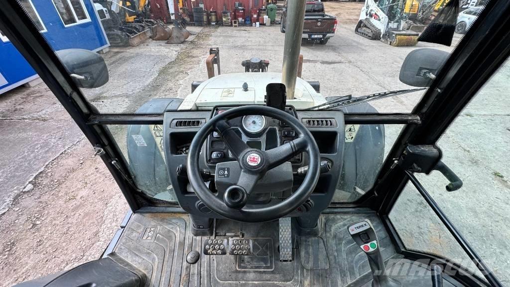 Terex TLB 990 PS 백호로더