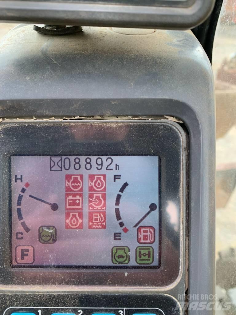 Komatsu PW 140-7  휠 굴삭기