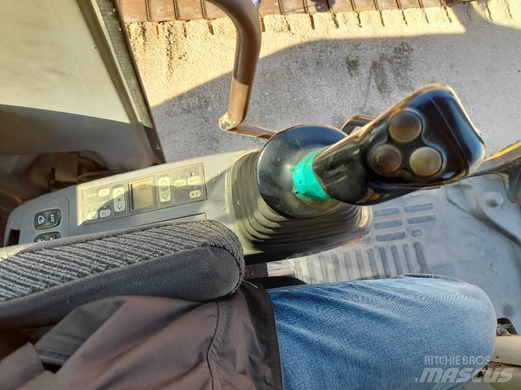 Komatsu PW200-7  휠 굴삭기
