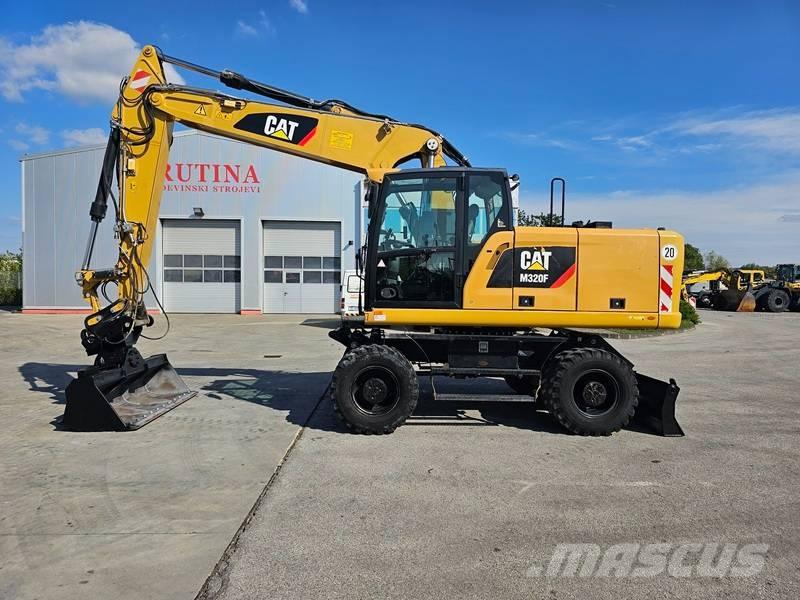 CAT M320F  휠 굴삭기