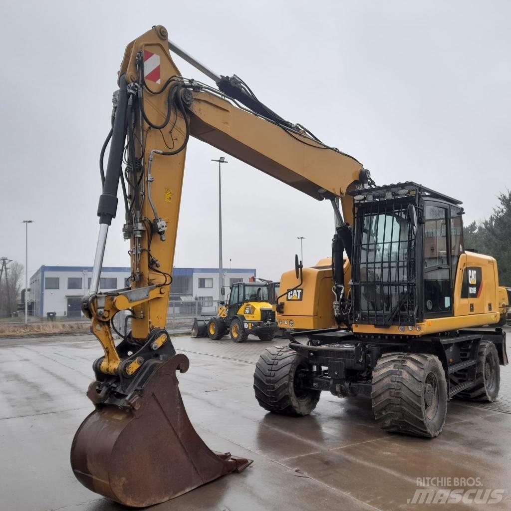 CAT M 318 F  휠 굴삭기