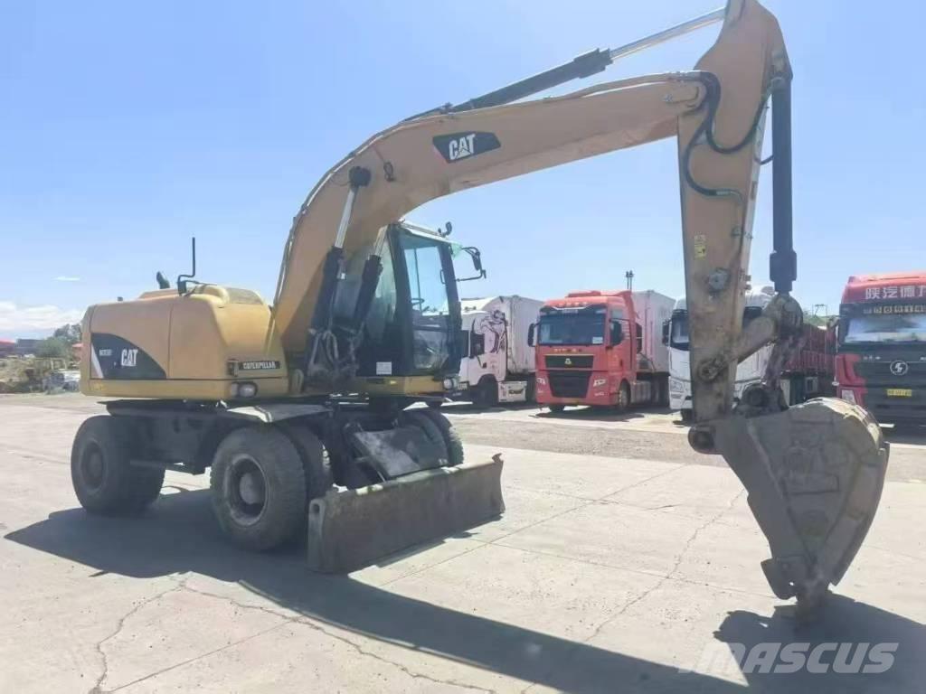 CAT M315D2  휠 굴삭기