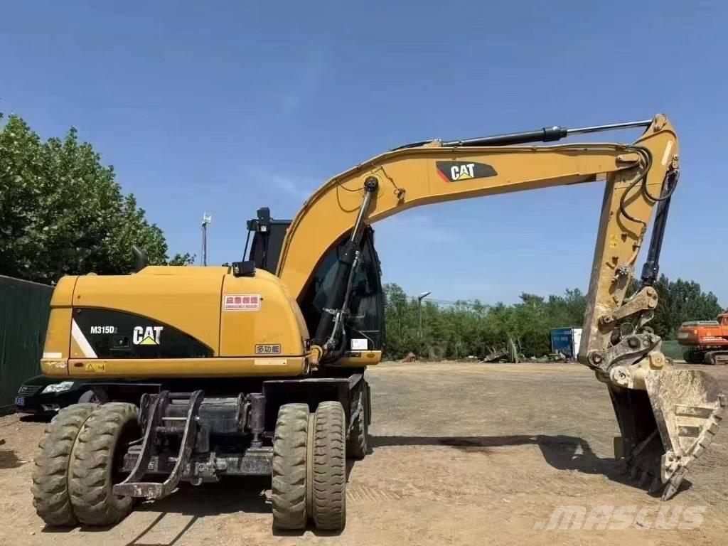 CAT M 315 D  휠 굴삭기
