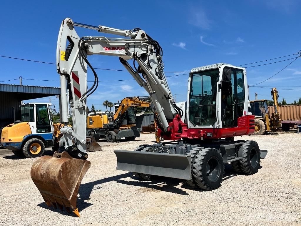 Takeuchi TB 295  휠 굴삭기