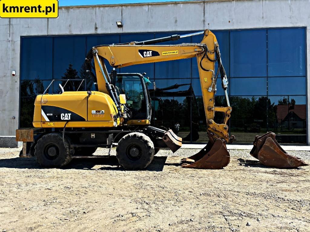 CAT M 313 D  휠 굴삭기