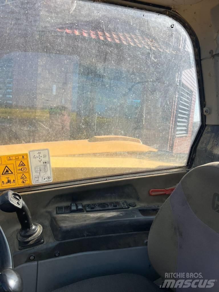 CAT TH 406 텔러 핸들러