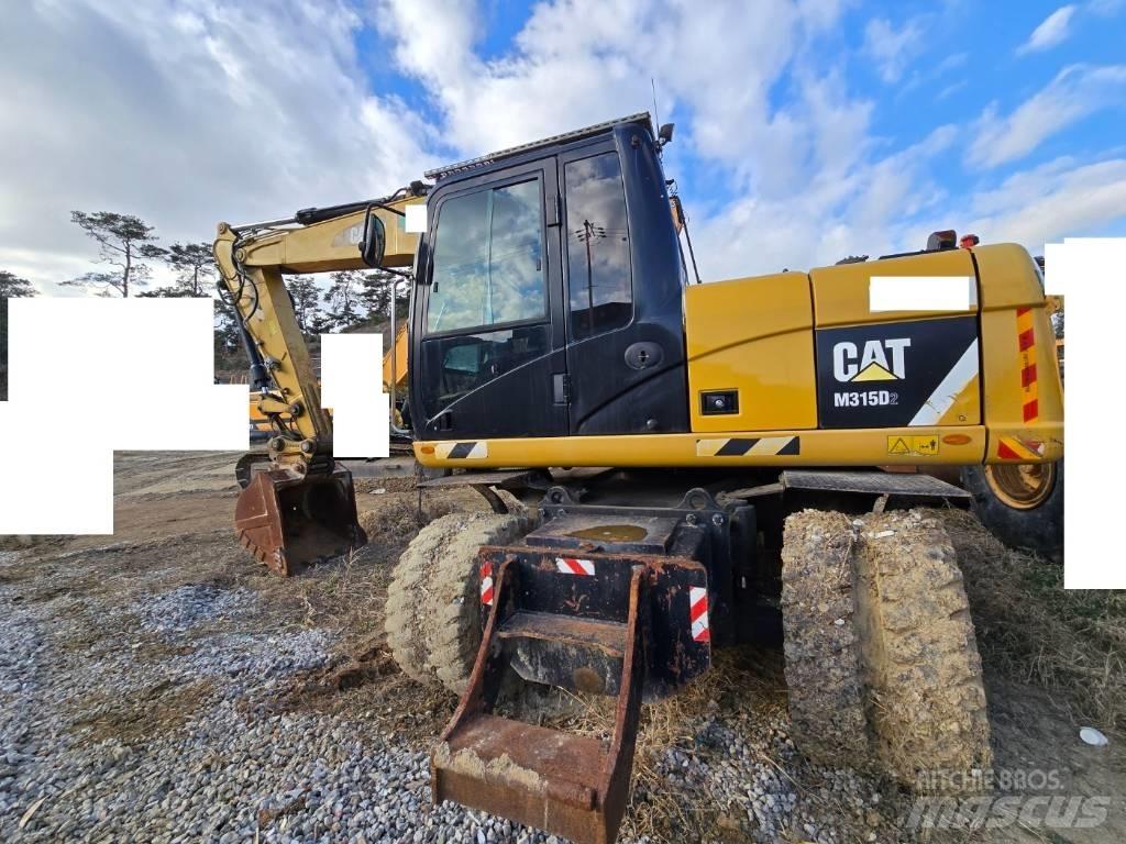 CAT M 315 D  휠 굴삭기
