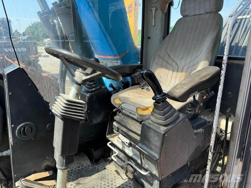 Fuchs MHL 320 폐기물/산업 처리기