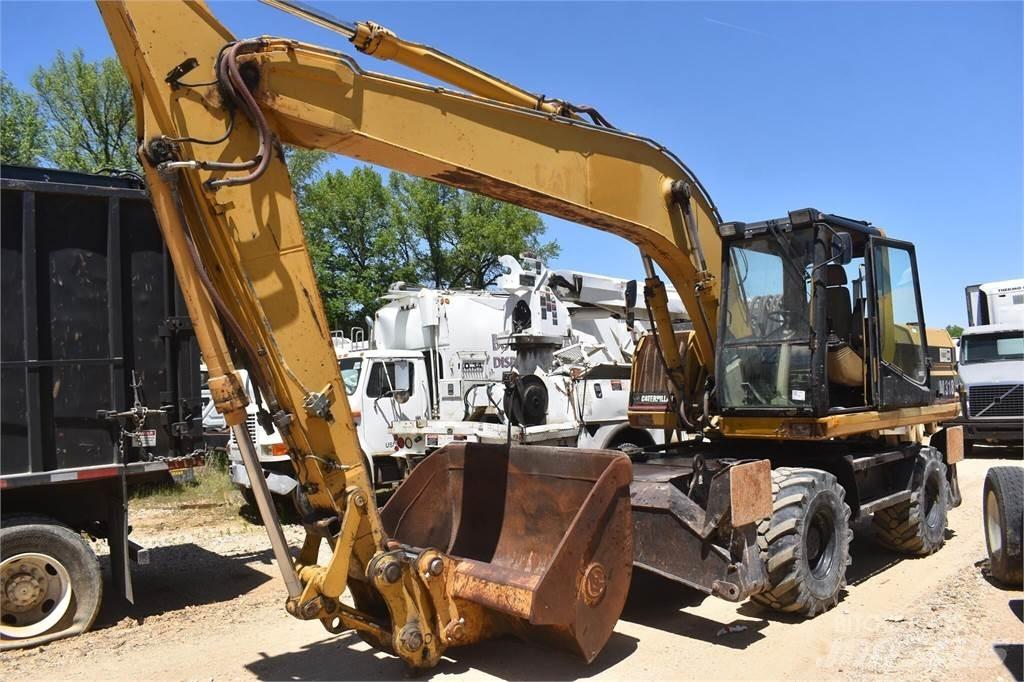 CAT M318  휠 굴삭기