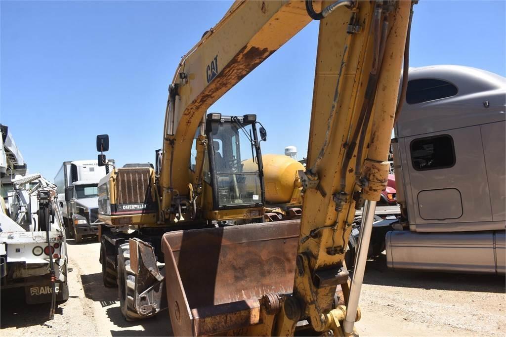 CAT M318  휠 굴삭기