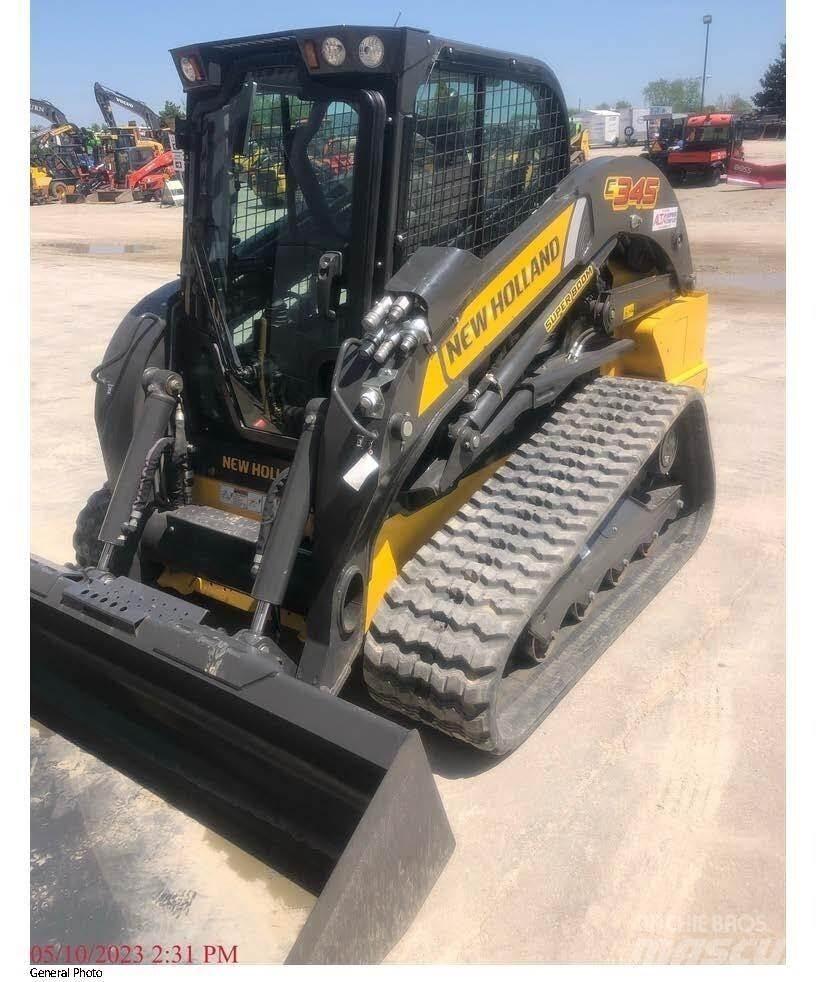 New Holland C345  스키드로더
