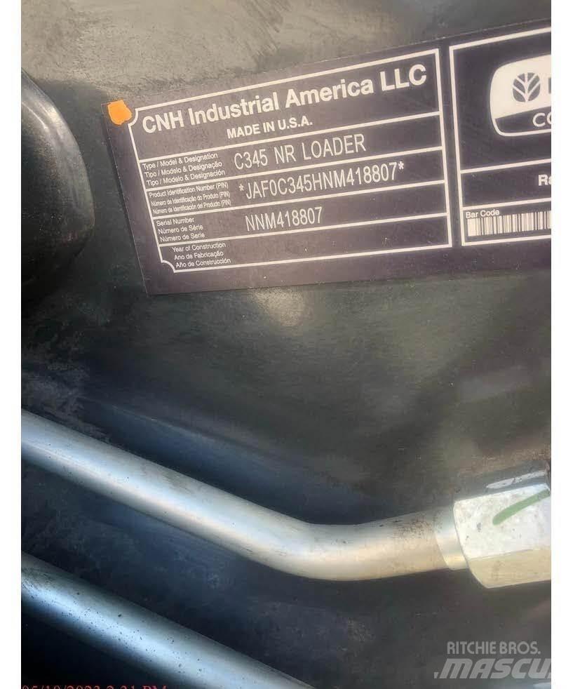 New Holland C345  스키드로더