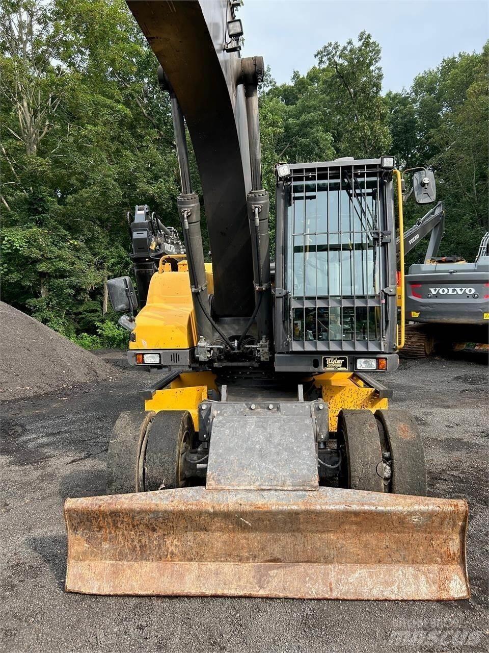 Volvo EW210D  휠 굴삭기