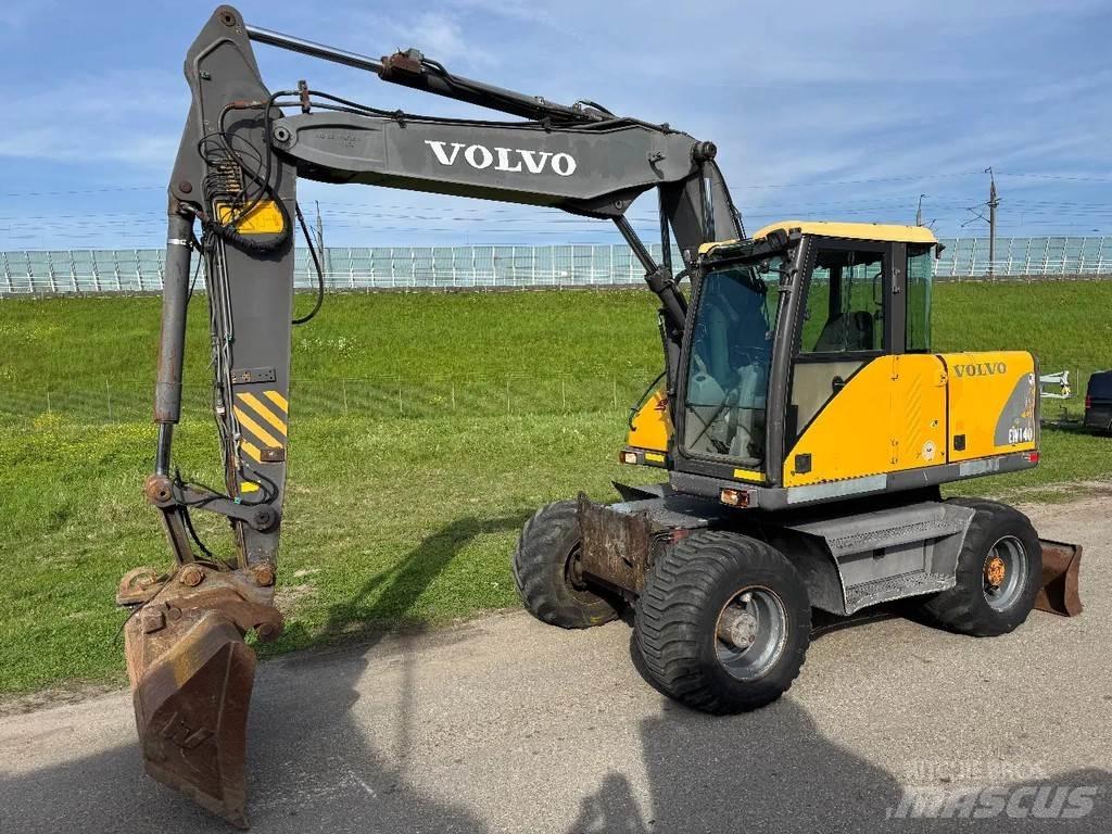 Volvo EW140  휠 굴삭기