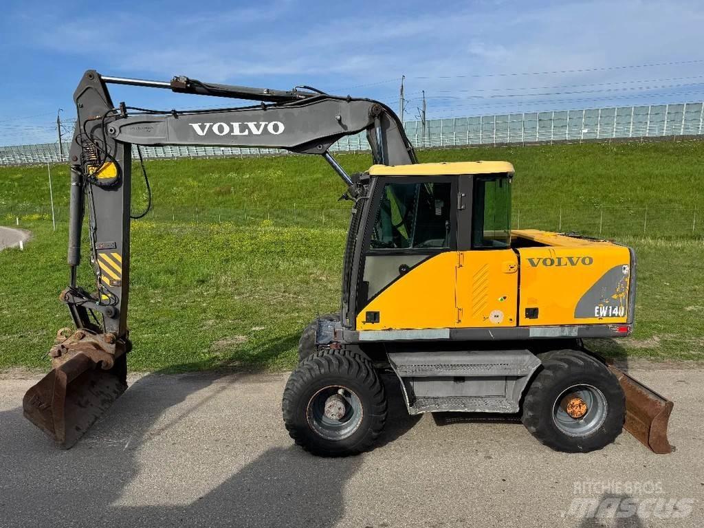 Volvo EW140  휠 굴삭기