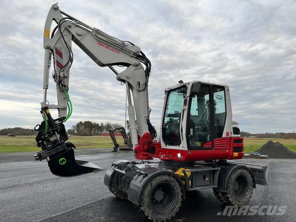 Takeuchi TB 395 W  휠 굴삭기