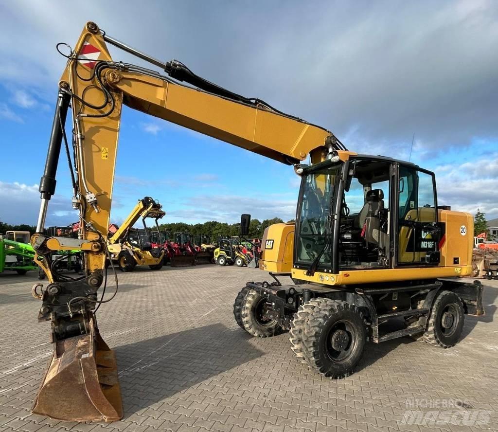 CAT M 318 F  휠 굴삭기