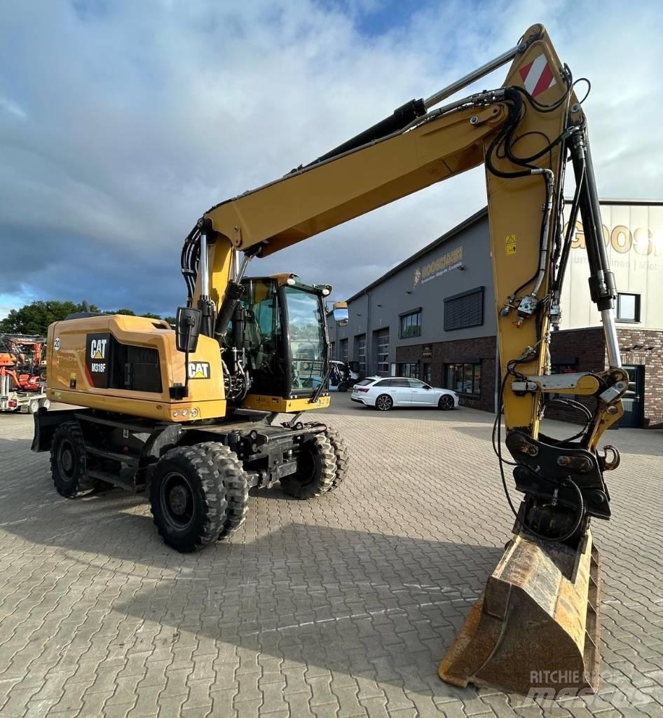 CAT M 318 F  휠 굴삭기