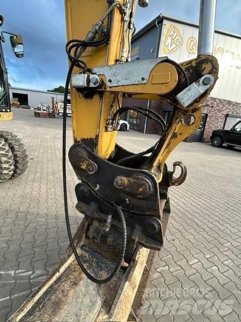 CAT M 318 F  휠 굴삭기