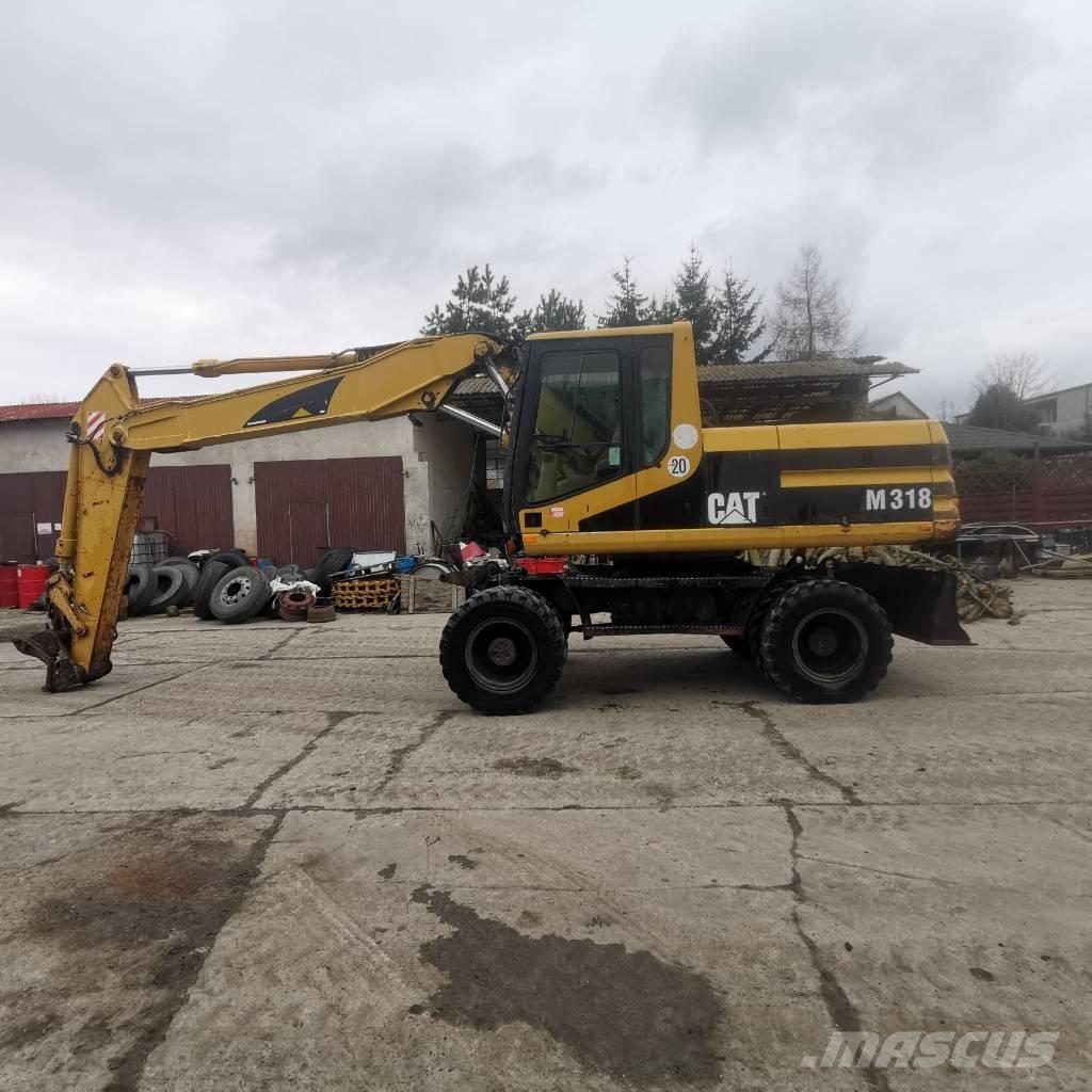 CAT M 318 B  휠 굴삭기